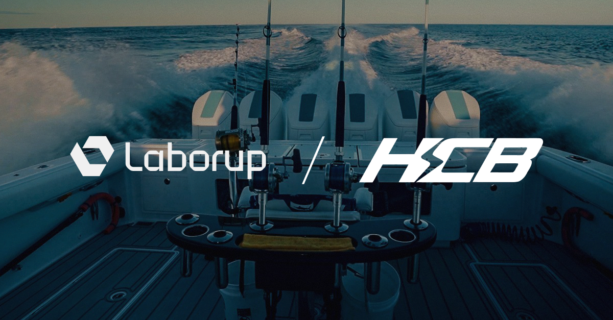 Laborup and HCB Yachts logos over a yacht on the water