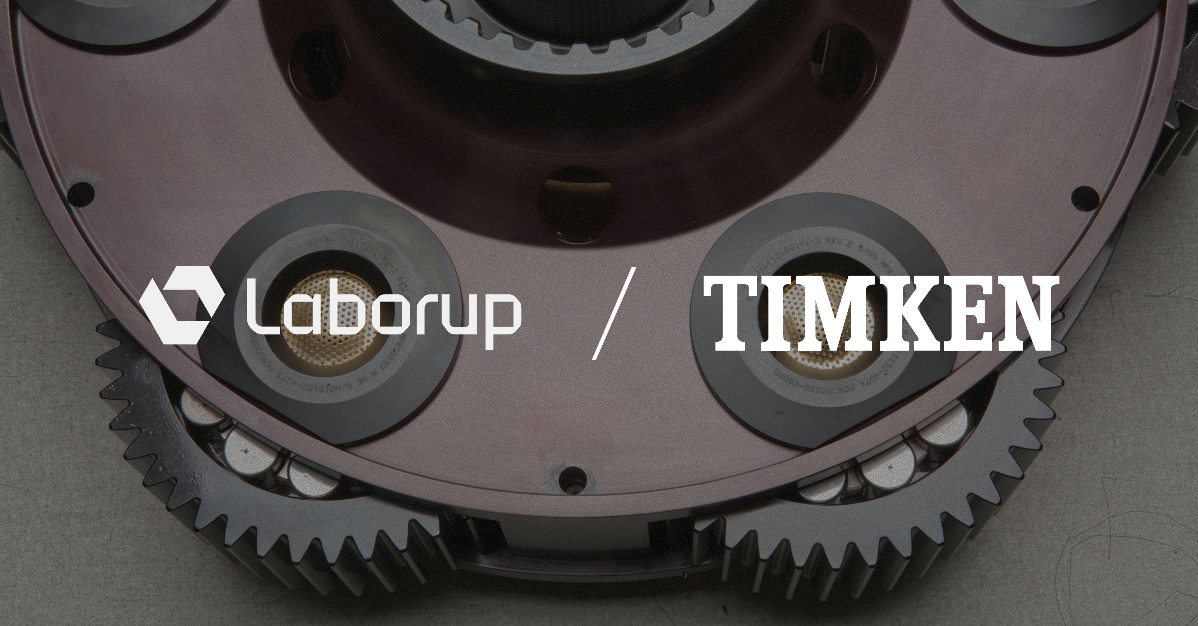 Laborup and Timken logos over a manufacturing operation