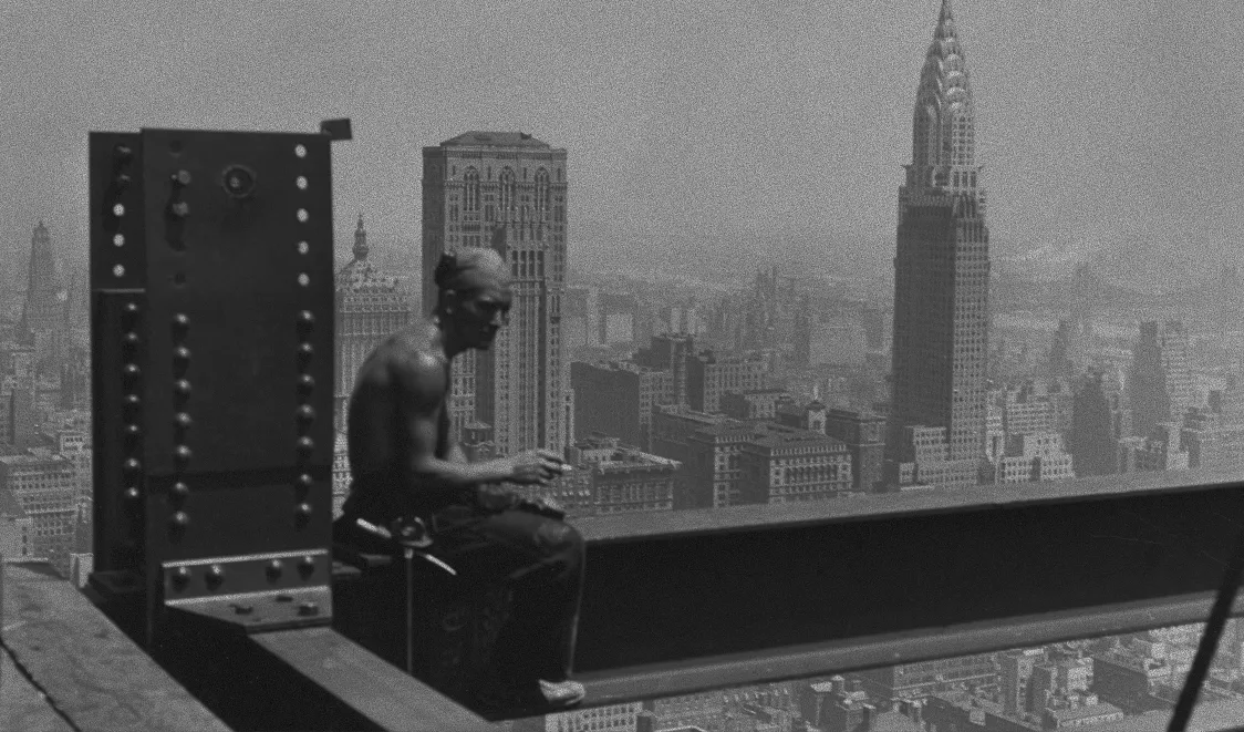 A steelworker builds above the New York skyline